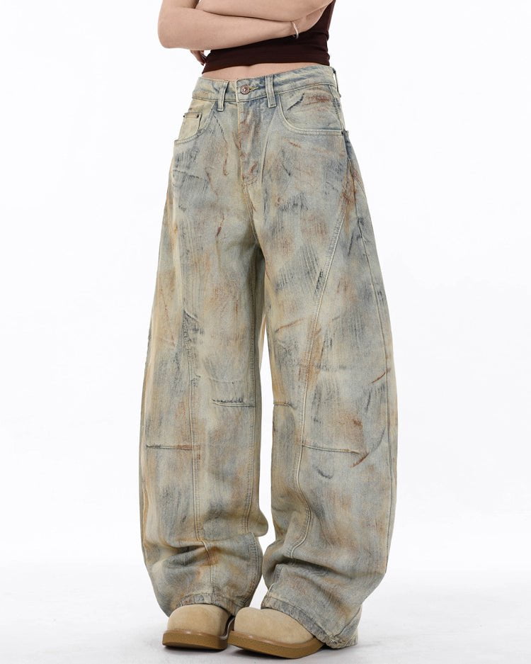 Arc-Cut Distressed Wide-Leg Jeans